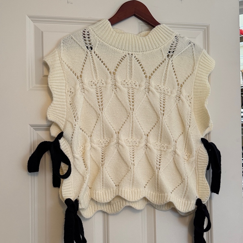 Elegant Cream Knit Sweater with Black Bow Ties